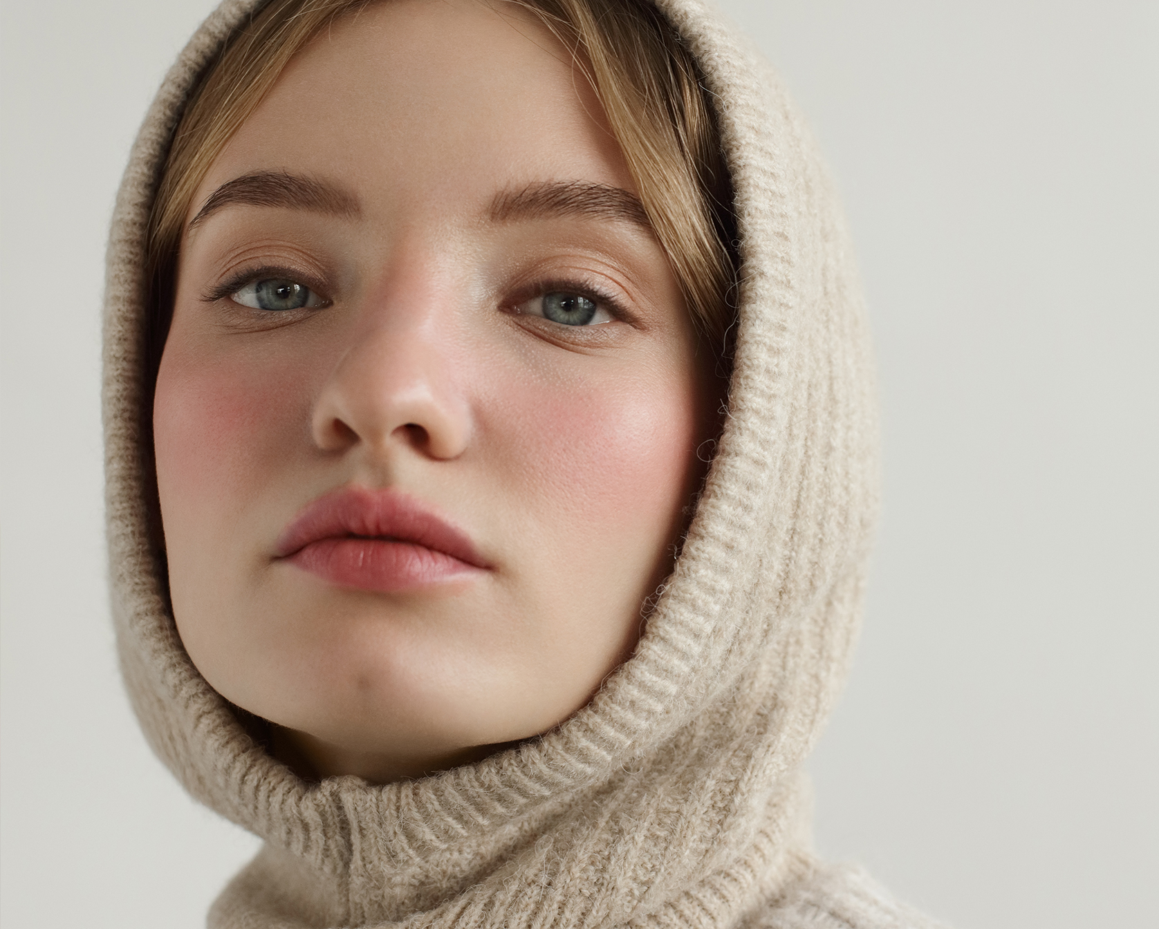 Woman in tan hood