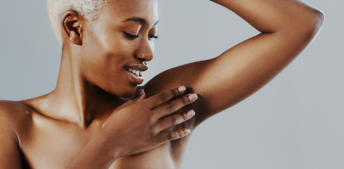 woman inspecting her arm